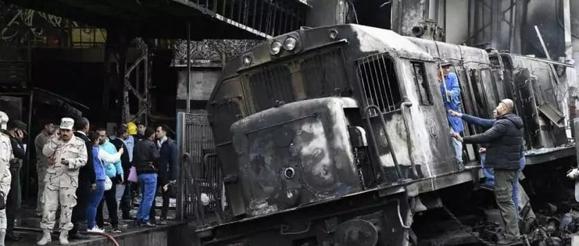 security forces and onlookers gather at the scene of a fiery train crash at the egyptian capital cairos main ramses railway station on february 27 2019. afp 1583790538609