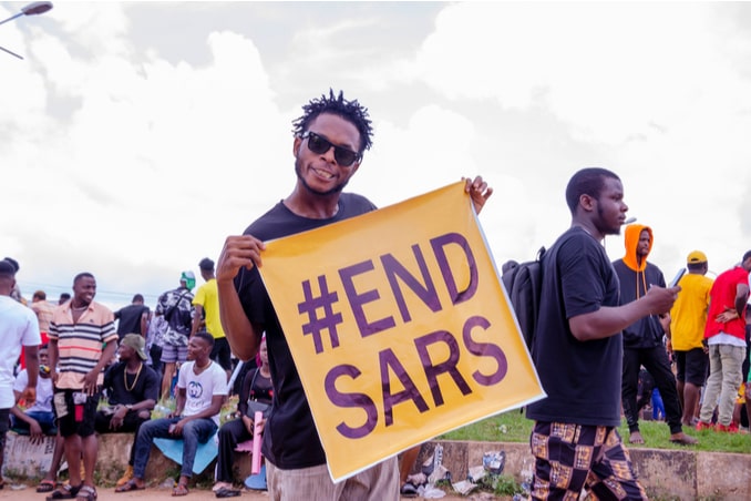 nigerian youths protesting around the city about end sars, end bad government, end police brutality in nigeria
