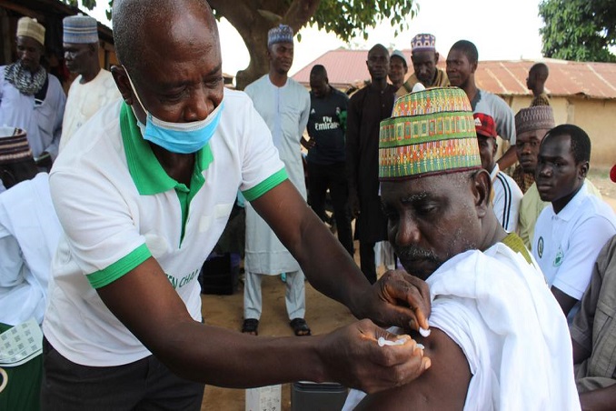 near the mosque in abuja worshippers offered virus vaccinations