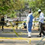 after bomb attacks in uganda police killed five people including a cleric
