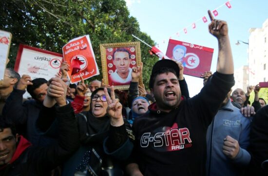 people attend demonstrations on the seventh anniversary of the toppling of president zine el abidine ben ali, in tunis