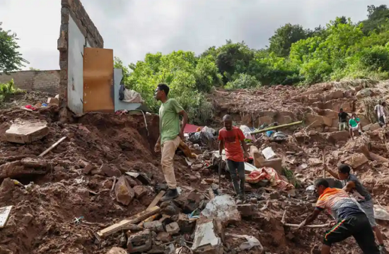 rescuers continue to seek missing people in south africas floods