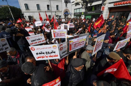 tunisians rally against the government with the ugtt labor union.
