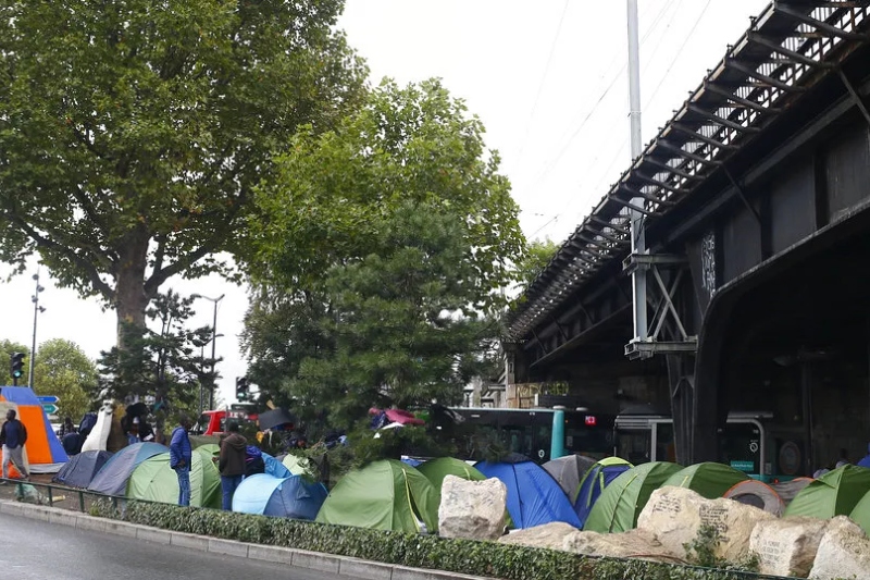 african migrants evicted from makeshift camp ahead of paris 2024 olympics