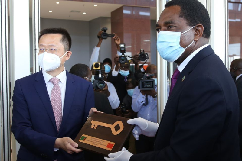 china pledges to assist zambia in restructuring its debt